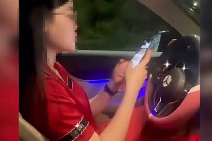 Xử phạt nữ tài xế buông 2 tay, dùng điện thoại khi lái xe
