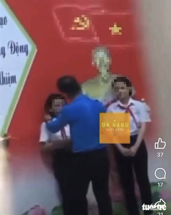 Xôn xao cán bộ trường ở Đà Nẵng túm cổ áo, vuốt tóc, áp sát mặt nữ sinh