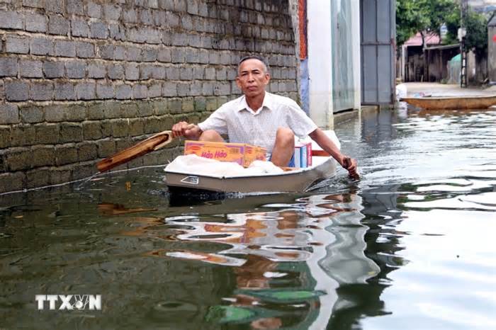 Hình ảnh ngập lụt nghiêm trọng ở xã Nam Phương Tiến tại Chương Mỹ