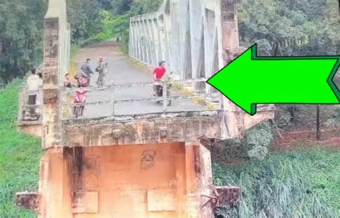 Video ghi lại cảnh nam thanh niên đi xe máy đến cầu rồi nhảy xuống sông