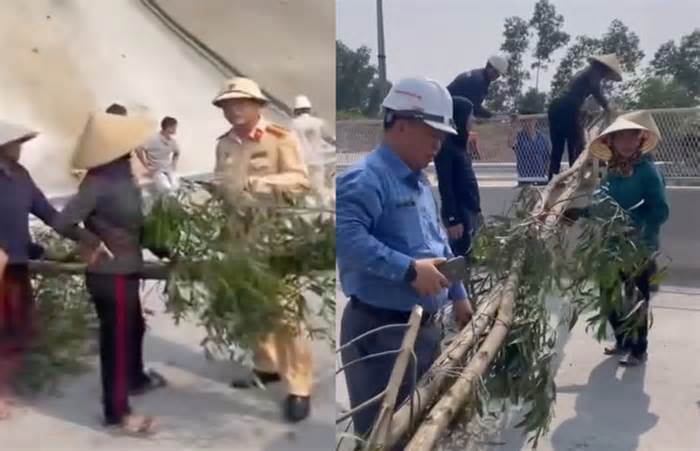 Người dân bức xúc mang cây chặn đường cao tốc Diễn Châu - Bãi Vọt