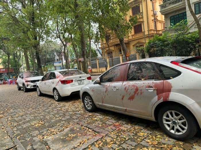 Tìm thủ phạm gây ra vụ tạt sơn hàng loạt ôtô ở Hà Nội