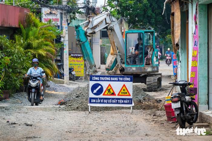 Người dân quận 12 than đường ngập, đoạn có cống đoạn không, địa phương nói gì?